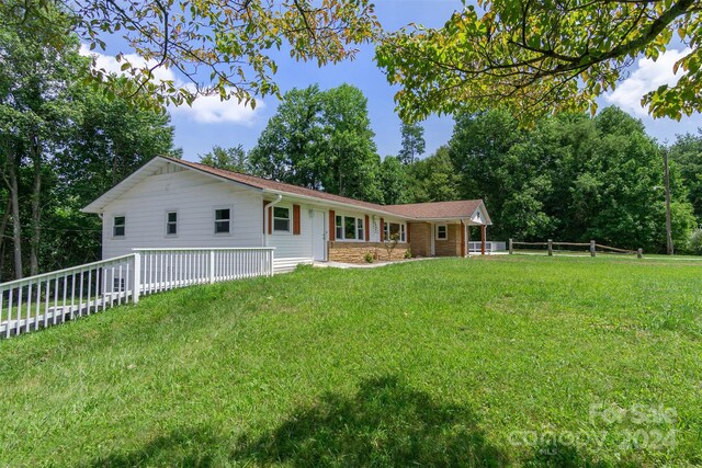 exterior space with a yard