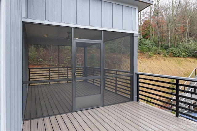 wooden terrace with a sunroom