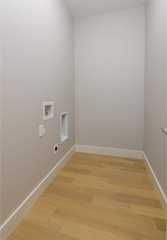 washroom featuring electric dryer hookup, washer hookup, and hardwood / wood-style floors