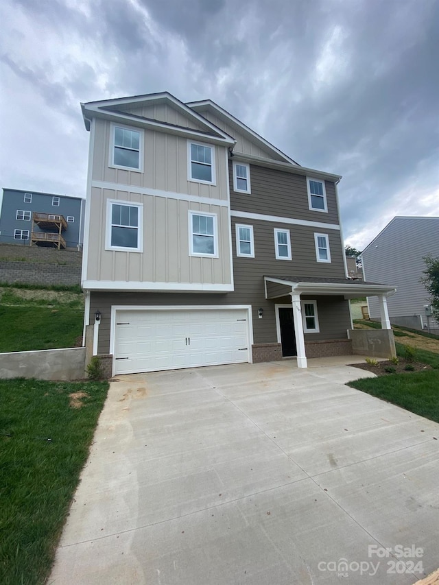 view of front of home with a garage