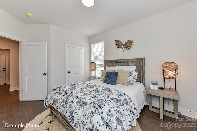 bedroom featuring dark hardwood / wood-style floors