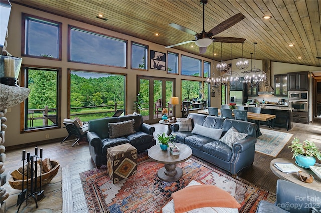 living room with a high ceiling, french doors, wood ceiling, ceiling fan with notable chandelier, and dark hardwood / wood-style floors