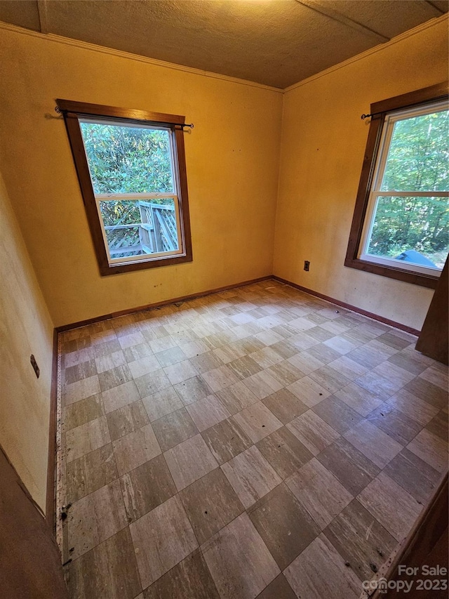 spare room with light tile flooring