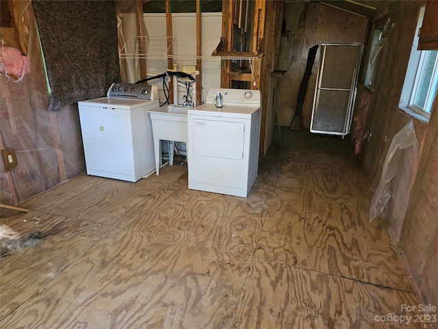 laundry area with washer and dryer