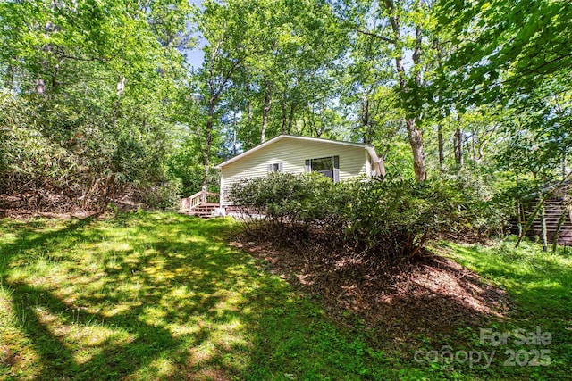 492 Laurelwood Ln Unit 33, Boone, NC 28607 - view of grassy yard featuring a deck