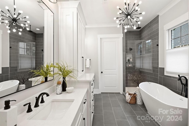 bathroom with shower with separate bathtub, tile patterned flooring, tile walls, vanity, and a notable chandelier