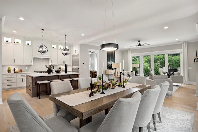 dining room featuring recessed lighting, ceiling fan, and light wood finished floors