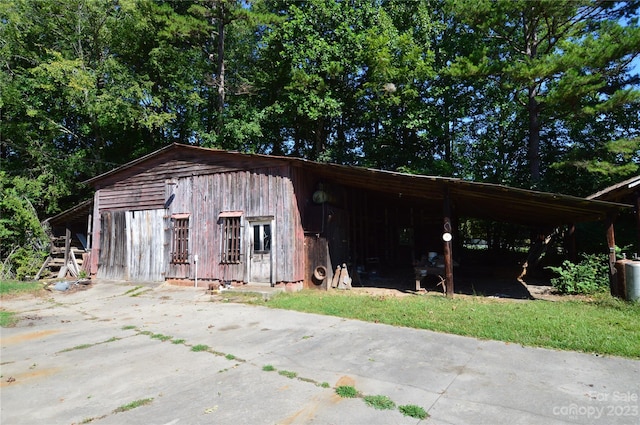 view of shed / structure featuring a carport