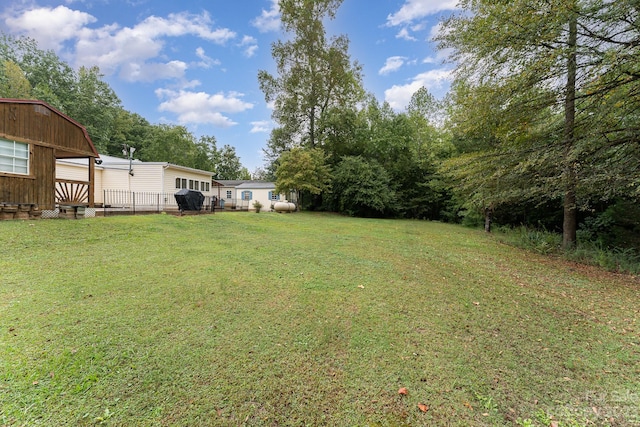 view of yard with a deck