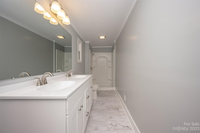 bathroom with dual sinks, tile floors, toilet, and vanity with extensive cabinet space