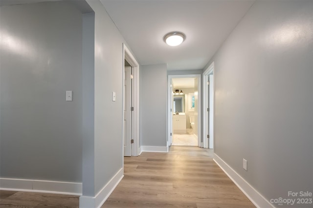 hallway featuring light hardwood / wood-style flooring