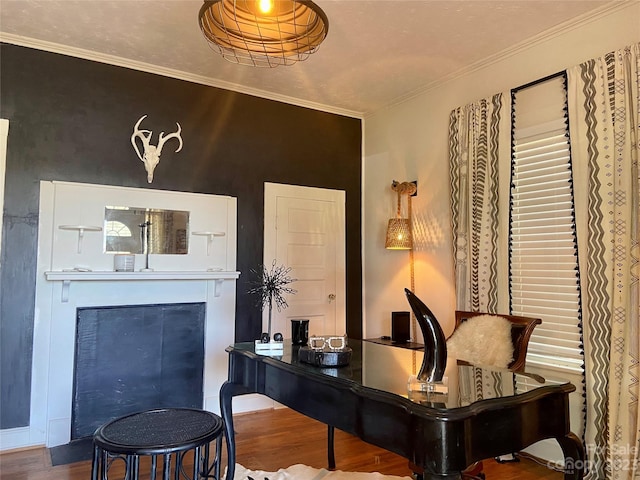 office with hardwood / wood-style floors and ornamental molding