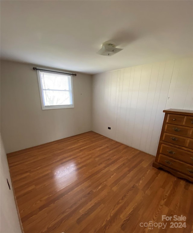 spare room featuring light wood-type flooring