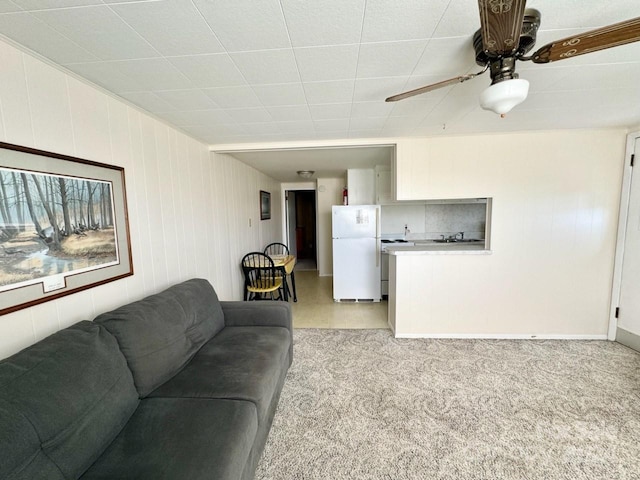 living room featuring ceiling fan