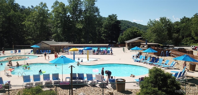 view of swimming pool with a patio