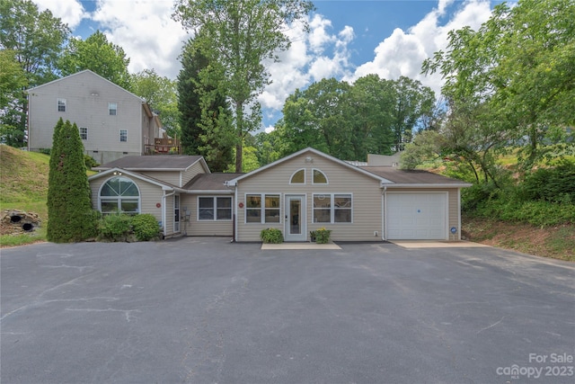 view of front of home featuring a garage