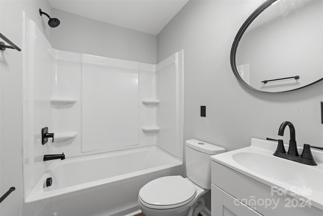 full bathroom with vanity, shower / washtub combination, and toilet