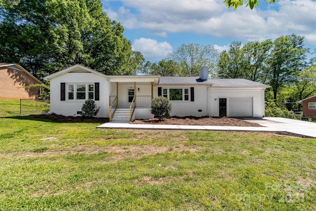 ranch-style house with a front lawn and a garage