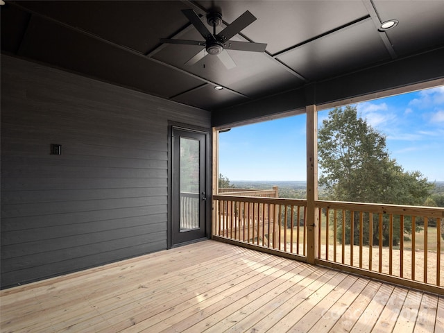 wooden deck with ceiling fan