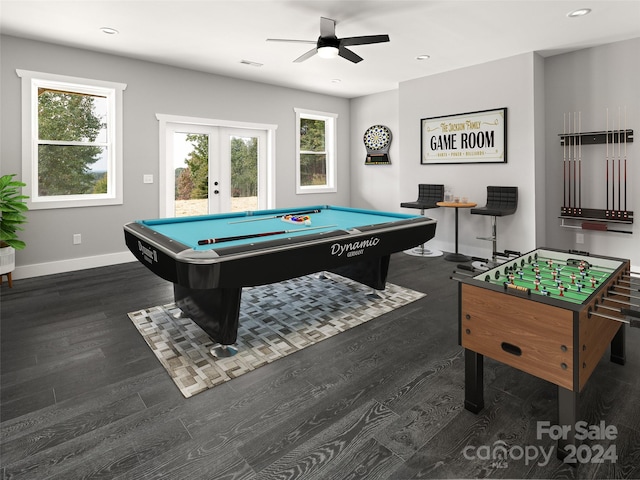 game room with plenty of natural light, dark hardwood / wood-style flooring, pool table, and french doors