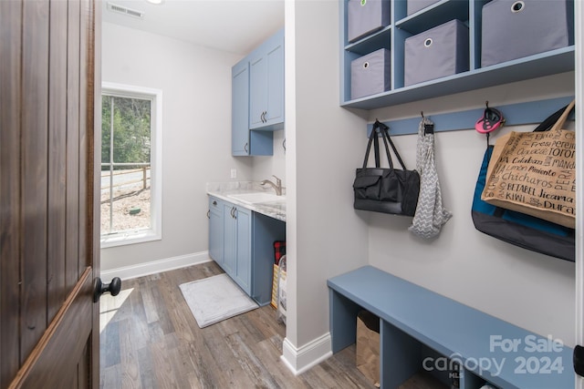 mudroom featuring sink and dark hardwood / wood-style floors