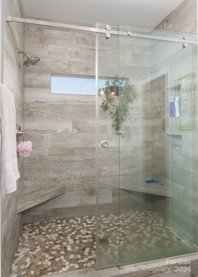 bathroom featuring walk in shower