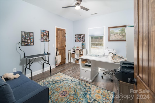 office space featuring ceiling fan and dark wood-type flooring