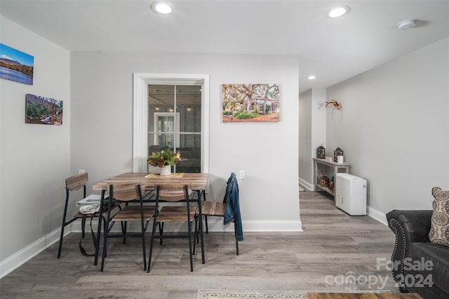 dining room with light wood-type flooring