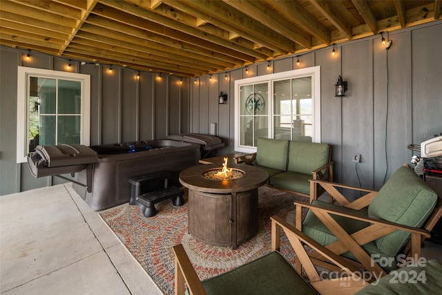 view of patio with a fire pit