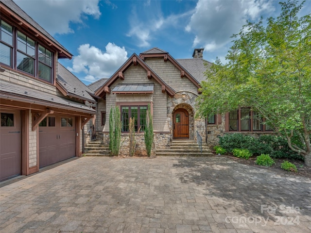 view of front of house featuring french doors and a garage