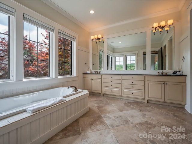 bathroom with a washtub, tile floors, dual sinks, and vanity with extensive cabinet space