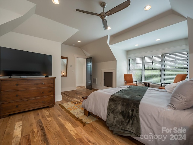 bedroom featuring ceiling fan and light hardwood / wood-style flooring