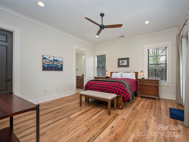 bedroom with light hardwood / wood-style flooring, ceiling fan, ensuite bath, and ornamental molding