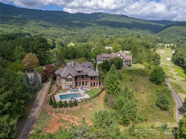 bird's eye view with a mountain view