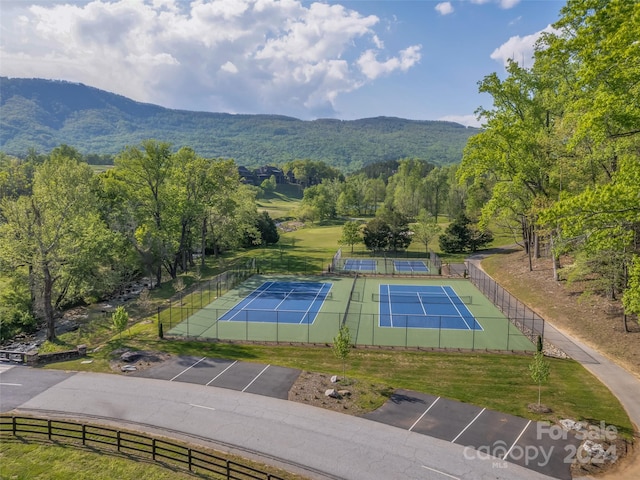 exterior space with a rural view and a mountain view