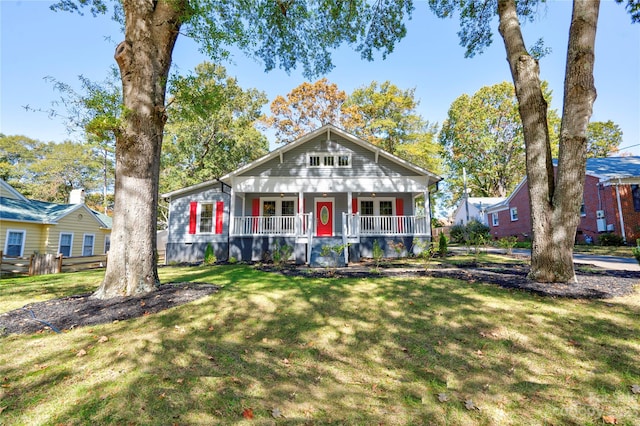 view of front of home featuring a porch and a front yard