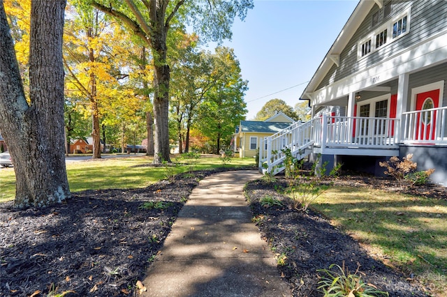 view of yard with a wooden deck