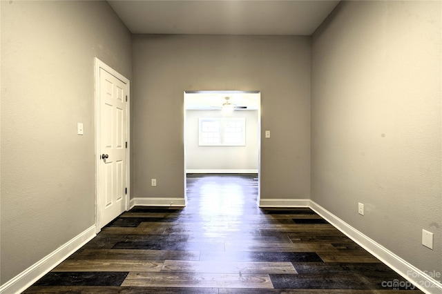 empty room with dark hardwood / wood-style floors