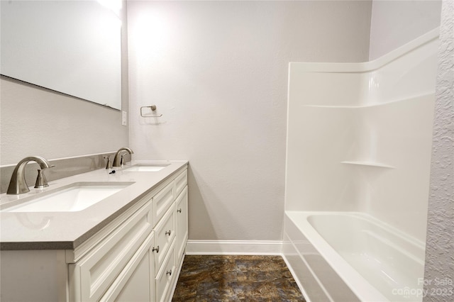 bathroom featuring dual vanity, bathing tub / shower combination, and tile floors