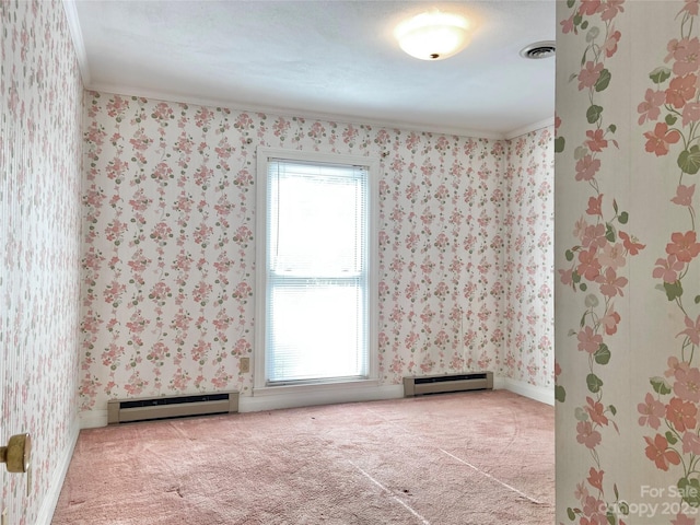 carpeted empty room featuring crown molding, a baseboard radiator, and plenty of natural light