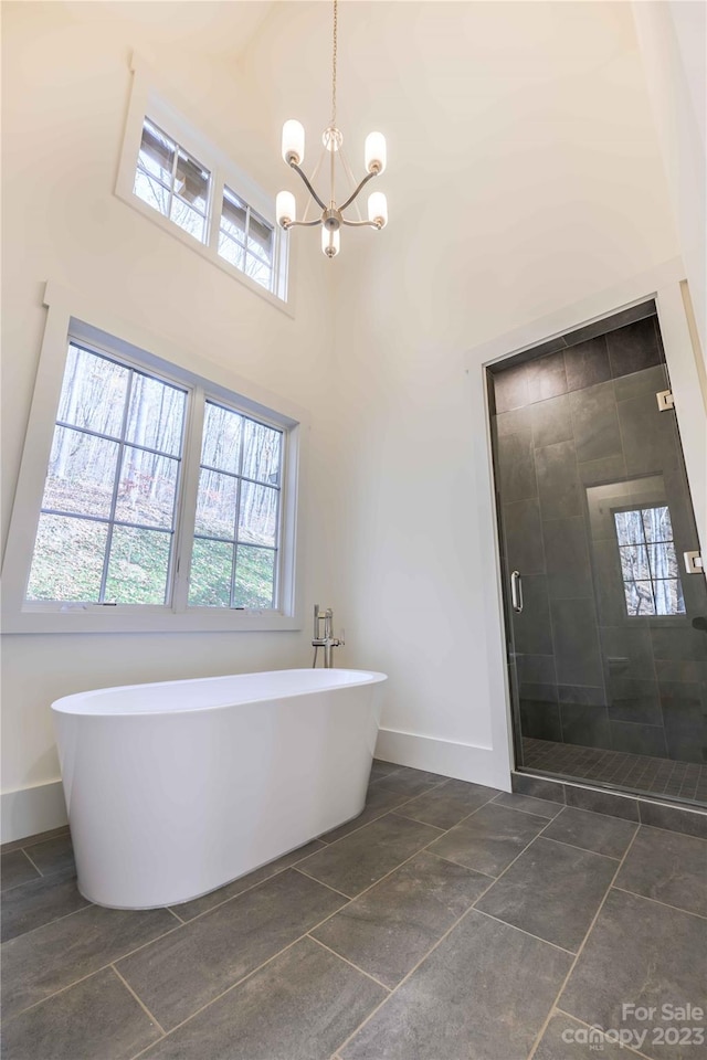 bathroom featuring tile flooring and a wealth of natural light