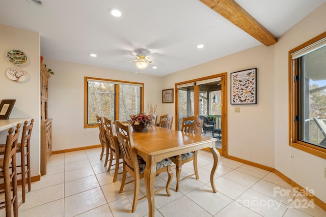 dining room featuring ceiling fan, beamed ceiling, and light tile patterned floors