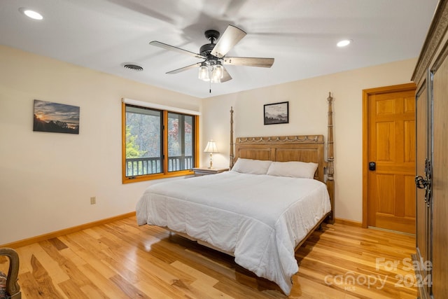 bedroom featuring ceiling fan and light hardwood / wood-style flooring