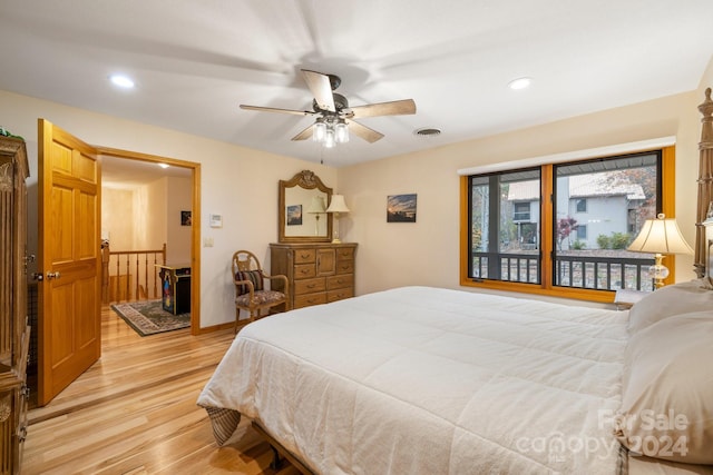 bedroom featuring light wood-type flooring and ceiling fan