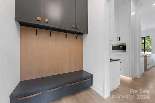 mudroom with light wood-type flooring