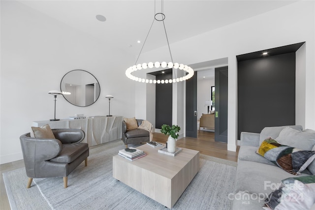 living room with light hardwood / wood-style flooring