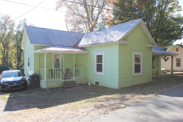 bungalow-style home with a porch