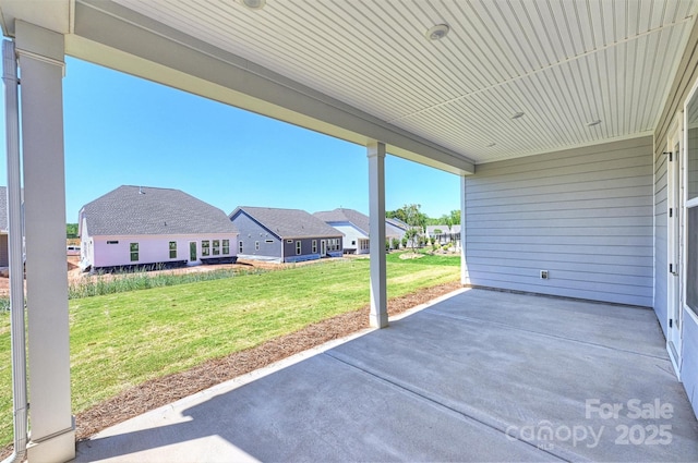 view of patio with a residential view