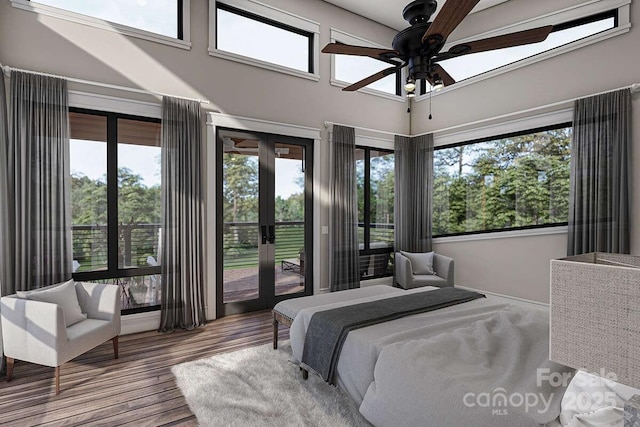 9999 Sourwood Rd, Canton, NC 28716 - bedroom featuring access to exterior, french doors, wood finished floors, and a ceiling fan