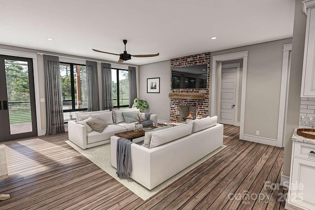 9999 Sourwood Rd, Canton, NC 28716 - living area with plenty of natural light, a fireplace, baseboards, wood finished floors, and recessed lighting